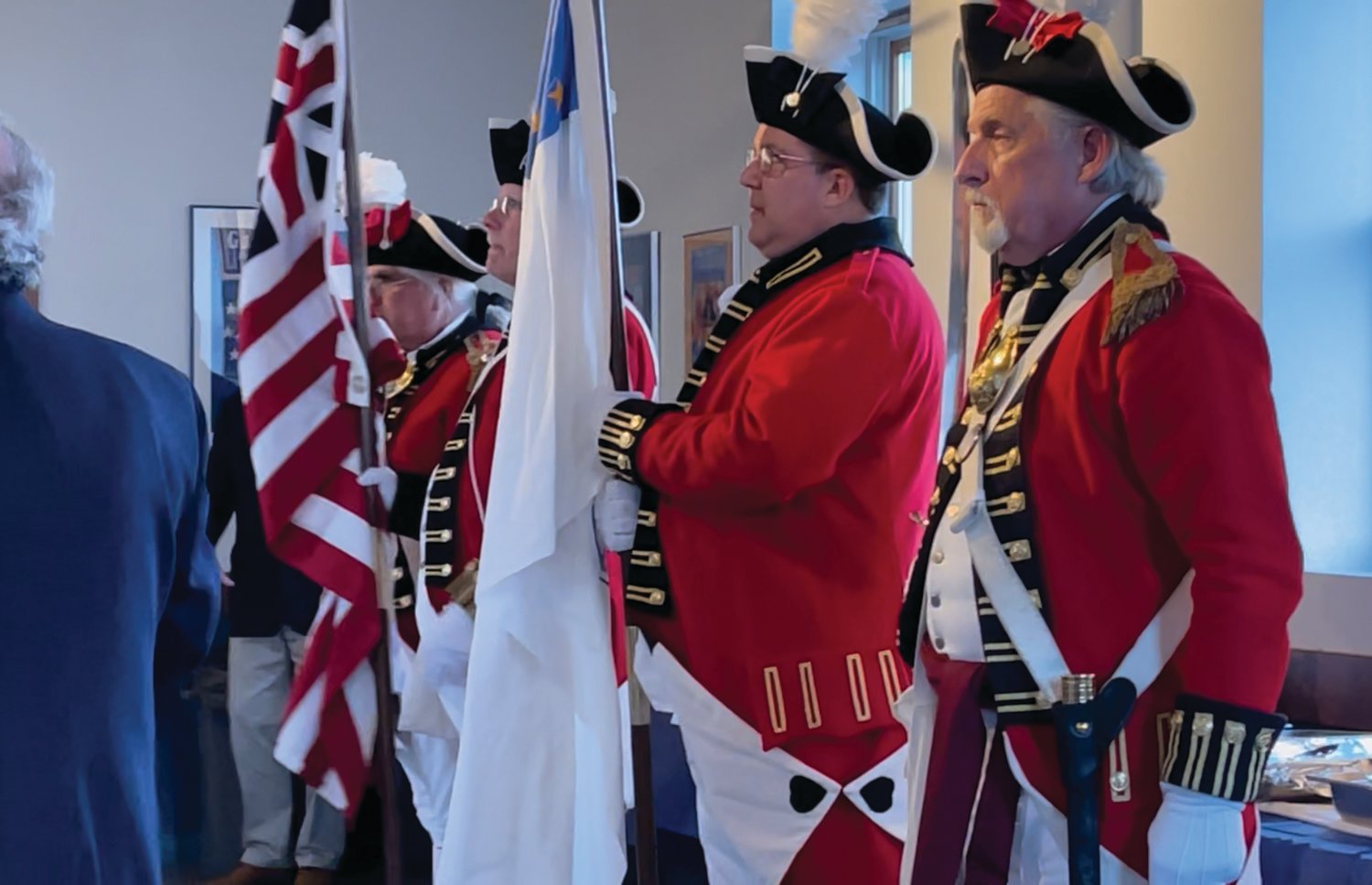 MAKING AN ENTRANCE: Members of the Pawtuxet Rangers led off last week’s ceremony, marching into the Aspray Boat House for a presentation of the colors.